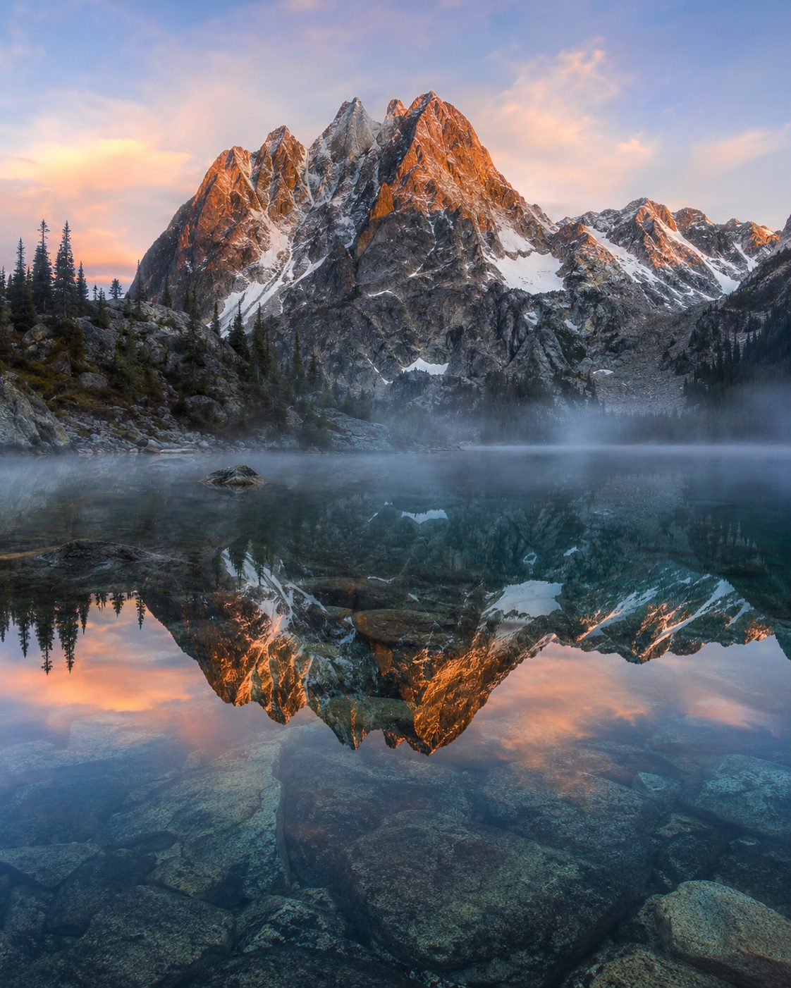 Alpine mountain lake reflection